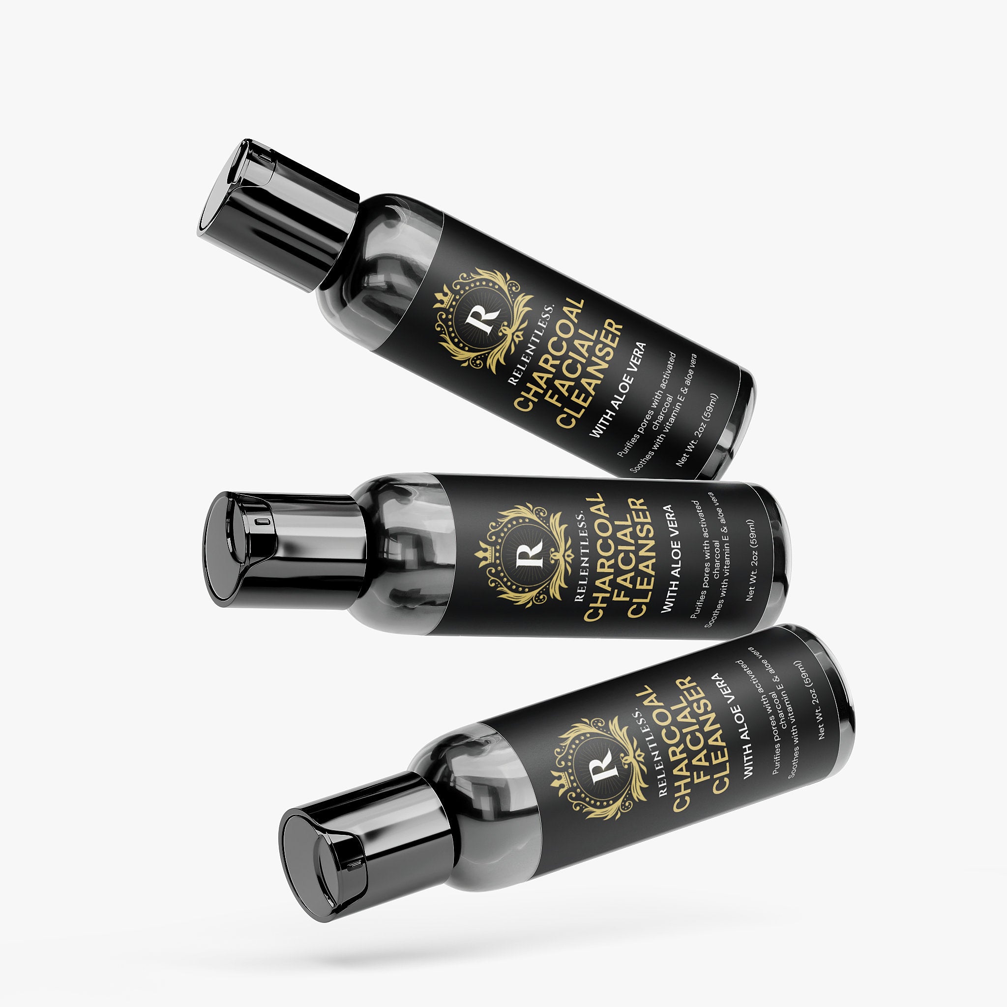Relentless Men's charcoal facial cleanser bottles on a white background, black flip-top bottles with gold label, aloe vera callout, 2 oz / 59 mL.